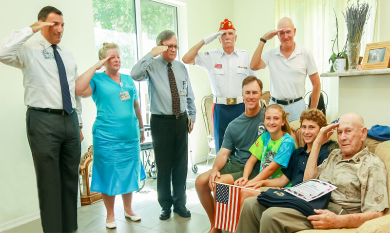Hospice workers salute a veteran