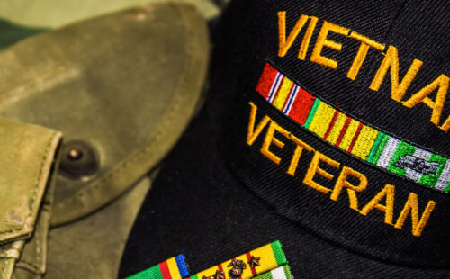 Close up on a hat that says Vietnam Veteran
